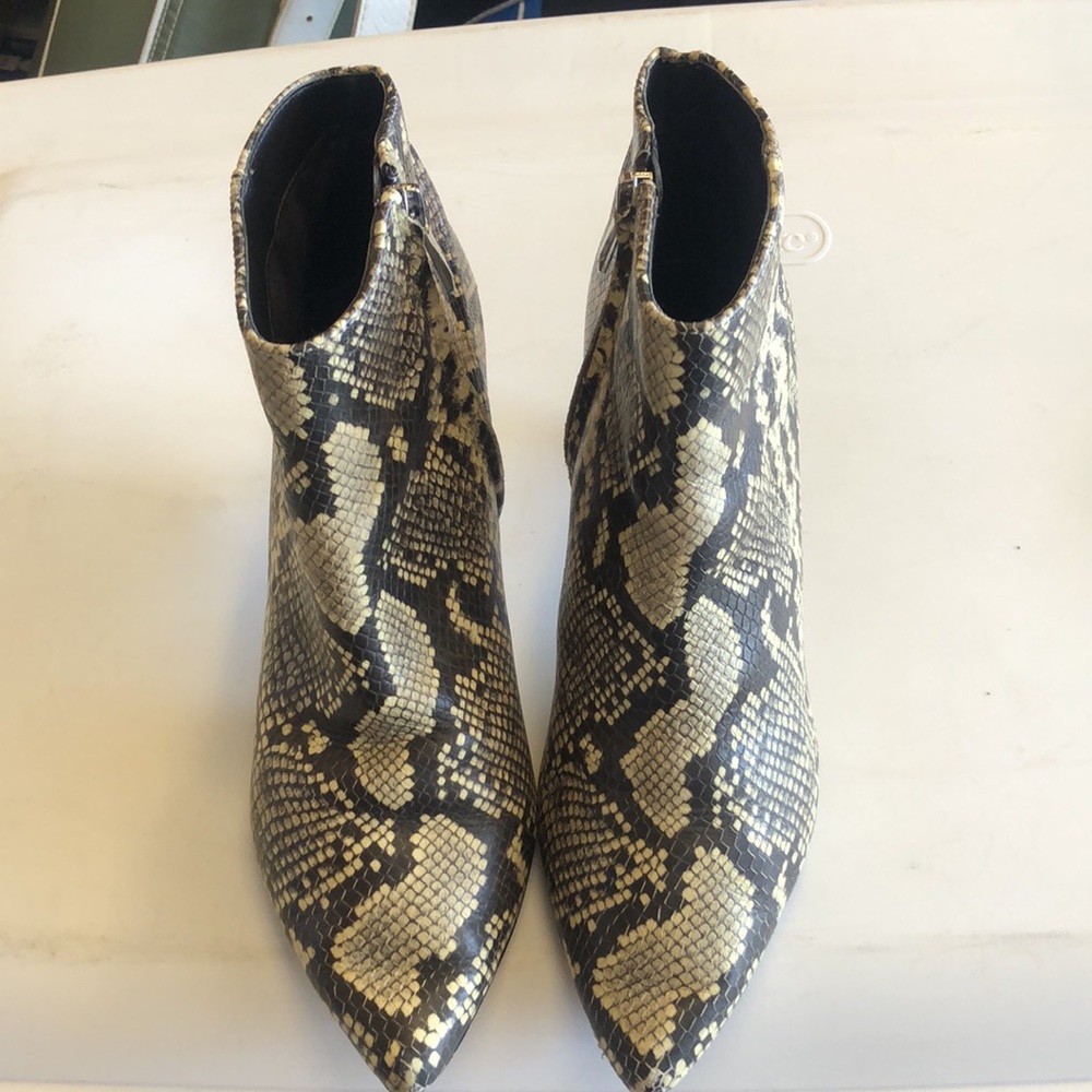 Snake skin ankle boots in excellent condition!  Short 2 inch heels